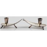 A pair of silver plated Carl Frederik Christiansen Danish candlesticks of tear drop shape, stamped