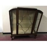 A mahogany glazed front single door display cabinet IMPORTANT: Online viewing and bidding only.