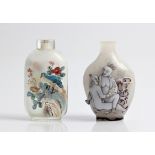 Two Chinese glass snuff bottles, one painted with birds and flowers, one decorated with erotic glass