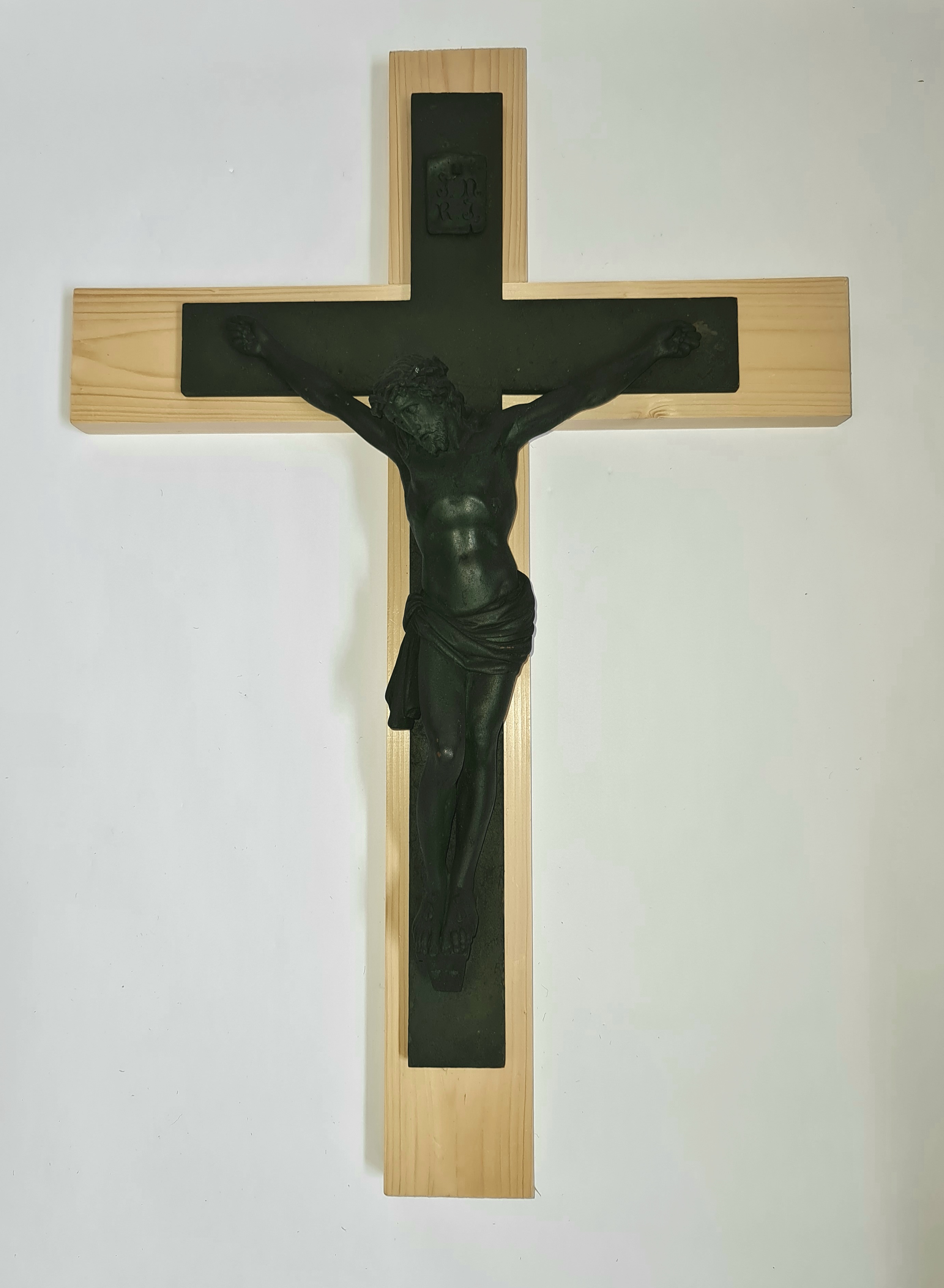Christ on Cross figure, mounted on wood, 74cm x 51cm. IMPORTANT: Online viewing and bidding only.