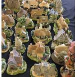 Approx. 27 Lilliput Lane buildings to include Claypotrs Castle, Wizards Tower, Pineapple House, etc.