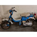 A Suzuki FZ50 blue and white moped. IMPORTANT: Online viewing and bidding only. Collection by