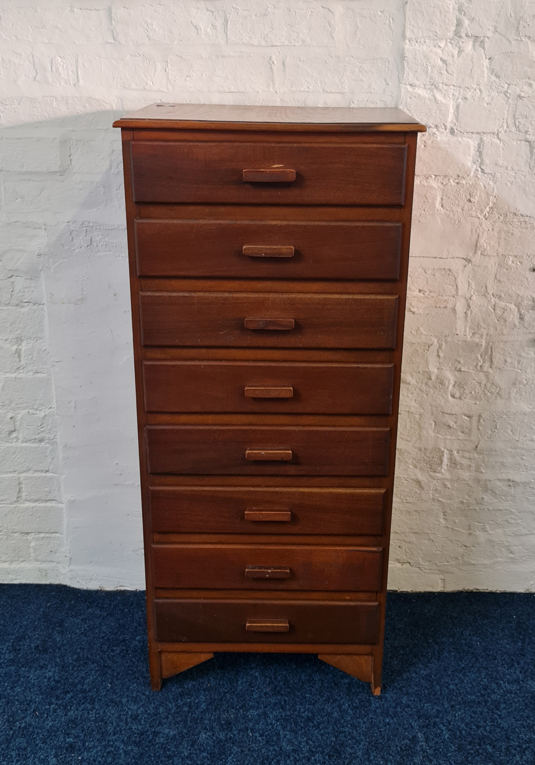 A narrow eight draw chest IMPORTANT: Online viewing and bidding only. Collection by appointment