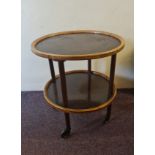 An Alpha-Roller Austria two tier round tea trolley. IMPORTANT: Online viewing and bidding only.