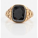 A hallmarked 9ct yellow gold hematite intaglio ring, ring size Q½.