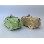 Two Sadler green and beige racing car teapots. IMPORTANT: Online viewing and bidding only.
