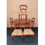 Victorian mahogany extending dining table with spare leaf and four turned floral column supports