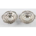 A pair of Victorian silver pierced dishes, hallmarked London 1892, diameter approx. 13cm. BOOK A