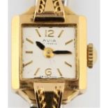 A ladies Avia wristwatch, the champagne dial having hourly baton markers with Arabic numerals to