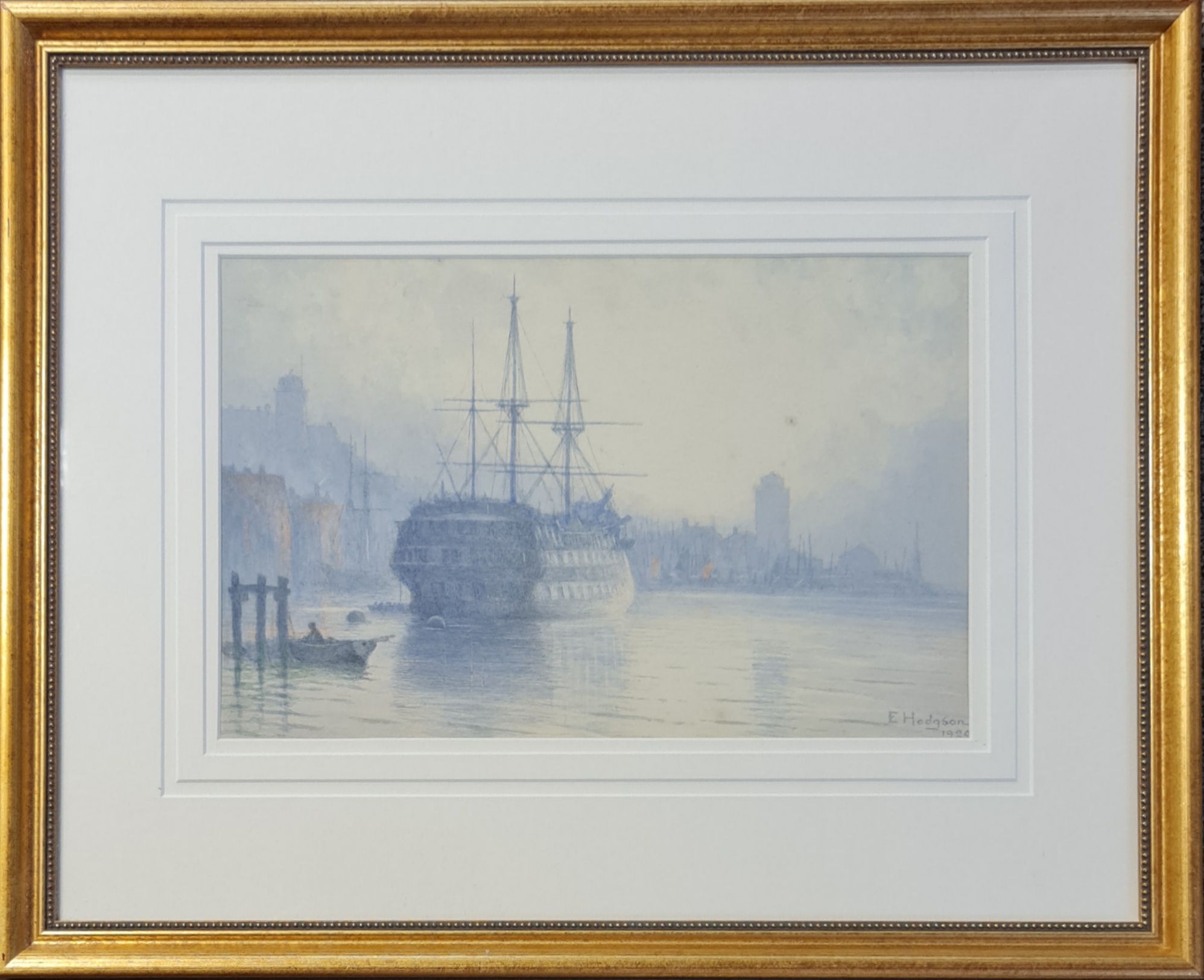 E. HODGSON. Framed, signed and dated 1920, watercolour on paper, ship on river beside town, 22cm x