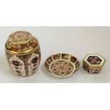 A Royal Crown Derby 1128 ginger jar and small plate, together with a Royal Crown Derby 1298