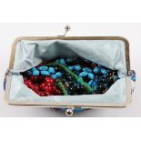 A collection of vintage beads, to include coral, turquoise imitation, glass and a transparent red