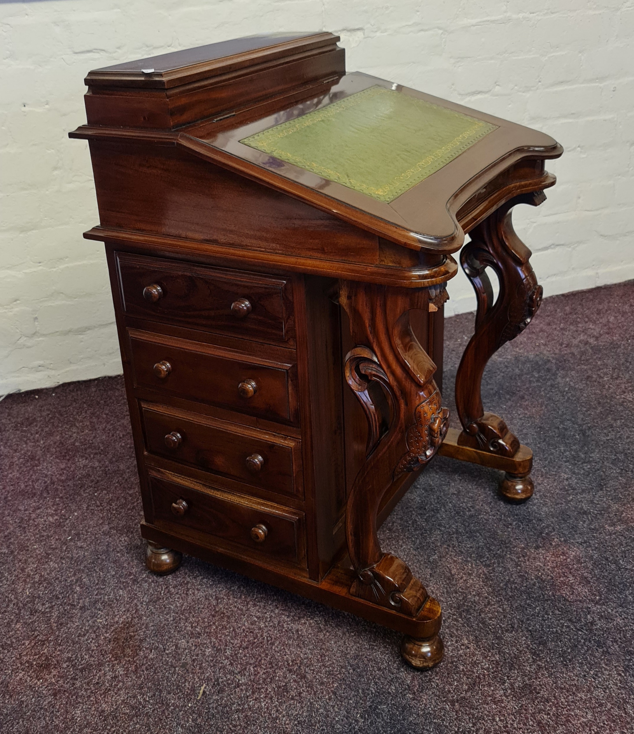 A mahogany reproduction davenport with four drawers to side. IMPORTANT: Online viewing and bidding