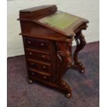 A mahogany reproduction davenport with four drawers to side. IMPORTANT: Online viewing and bidding