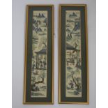 Two framed embroidered kimono sleeve panels depicting figures in house before mountainous