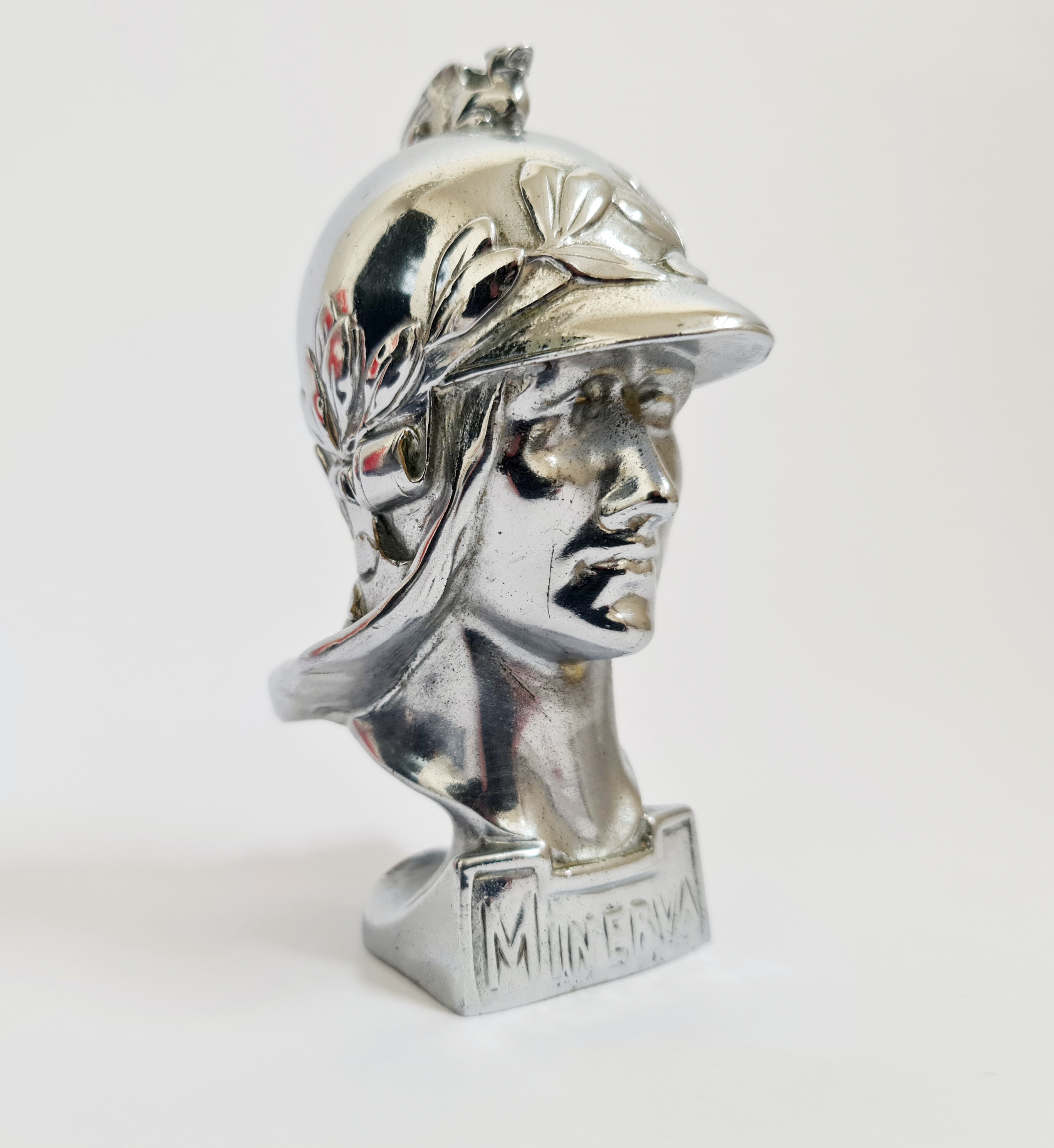 A Minerva chrome car mascot in the form of female warrior. IMPORTANT: Online viewing and bidding