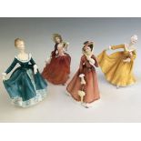 Four Royal Doulton figures, Julia, Kirsty, Janine and Autumn Breezes. IMPORTANT: Online viewing
