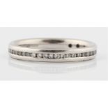 A hallmarked platinum diamond eternity ring, set with 35 round brilliant cut diamond accents,