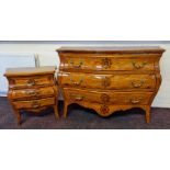 A reproduction king wood and walnut style French three drawer chest with two matching bedside