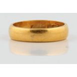 A hallmarked 22ct yellow gold plain wedding band, ring size J, approx. weight 4.2gms. BOOK A VIEWING
