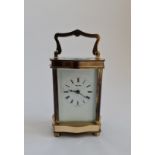 A brass Henley carriage clock. IMPORTANT: Online viewing and bidding only. Collection by appointment