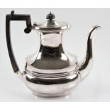 A Victorian silver coffee pot, the tapering shape having reeded middle, hallmarked Sheffield 1898,