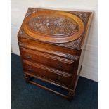 An oak carved front bureau. IMPORTANT: Online viewing and bidding only. Collection by appointment