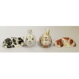 Four Royal Crown Derby animal figures, including two rabbits, one dog and one cat, all with gold