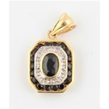 A hallmarked 18ct yellow gold sapphire and diamond pendant, the octagonal design set with central