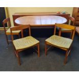 A teak mid century extending dining table with two leaves and six chairs. BOOK A VIEWING TIME SLOT