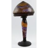 A reproduction Galle cameo glass lamp with mountain landscape design, approx height 50cm. BOOK A
