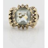 A single stone aquamarine ring, set with a central cushion cut aquamarine, measuring approx. 10mm,