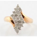 A diamond cluster ring, set with 19 round brilliant cut diamonds in zigzag formation, total