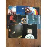 Nine LP records by Electric Light Orchestra.
