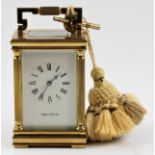 A Maplin and Webb brass carriage clock, five glass panels and roman numerals, approx 14cm x 8cm x