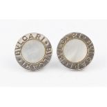 A pair of BULGARI mother of pearl stud earrings, each set with a circular panel of mother of pearl