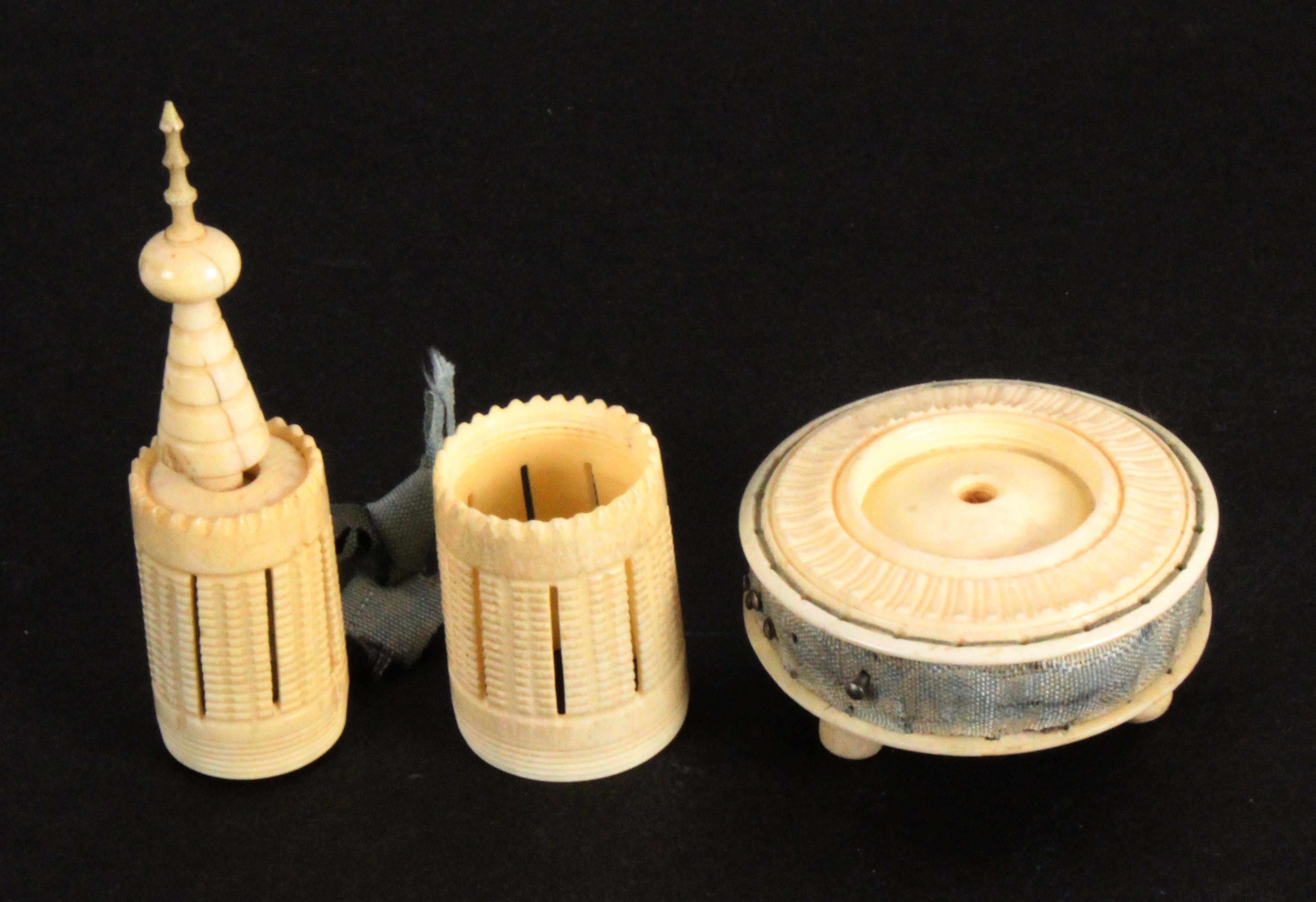 An early 19th Century turned ivory sewing tower, the circular base on three ball feet and fitted - Image 3 of 3