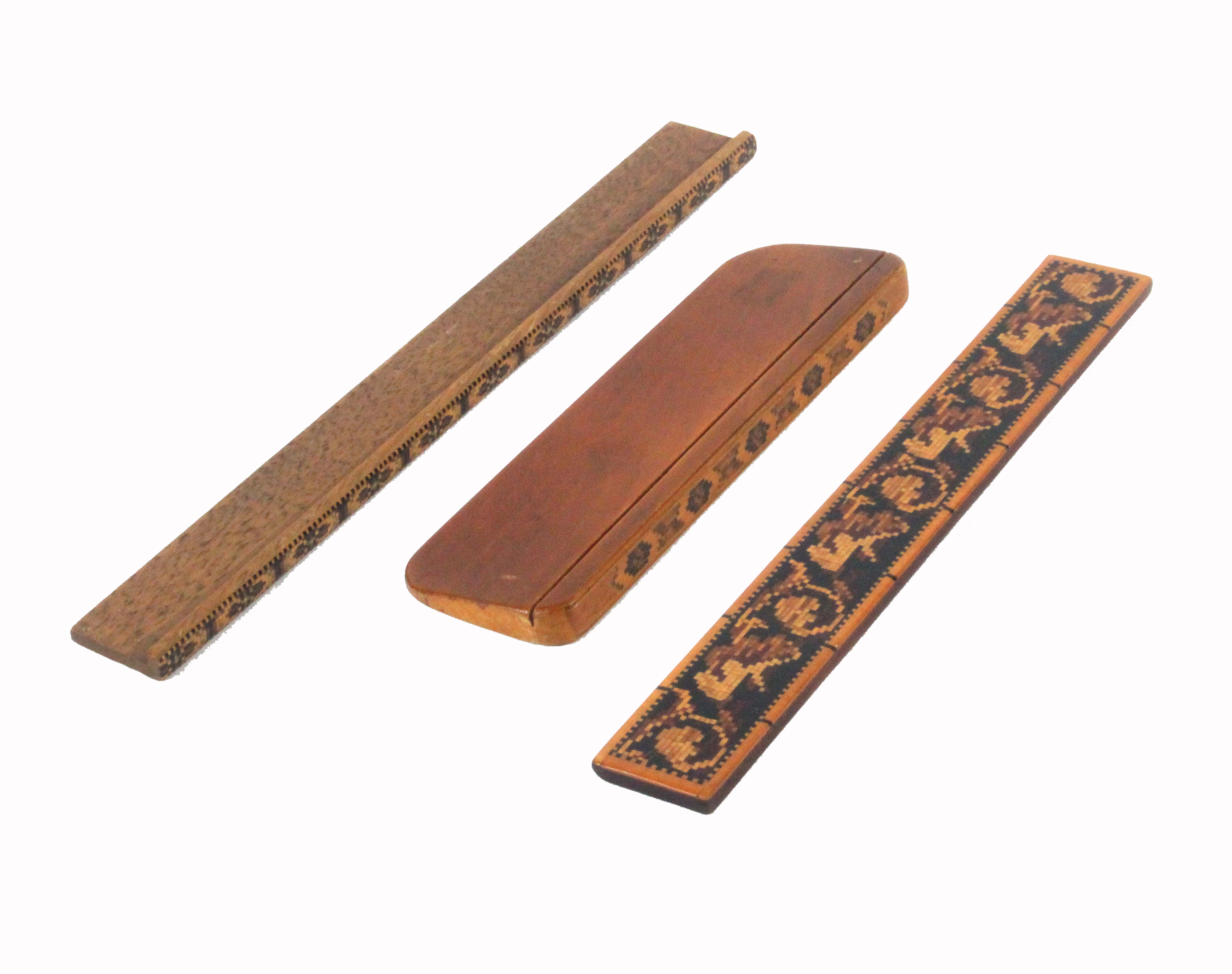 Tunbridge ware - three pieces, comprising a geometric mosaic ruler, 20.2cms, a scrabble ledge