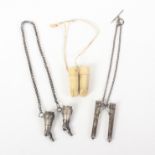 Three pairs of knitting needle protectors, comprising a silver pair in the form of lady's boots