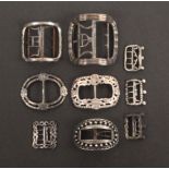 Single shoe buckles, comprising a large Georgian silver plated example, 7.7 x 7.8cms, another, three