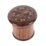 A Tunbridge ware rosewood nutmeg grater, the over hanging screw top with a circular panel of stick
