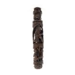 A carved wood or coquilla 'love token' cylinder needle case, the finial carved as a head and hat