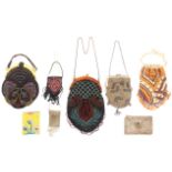 Eight early 20th Century beadwork bags and purses, comprising two geometric examples with