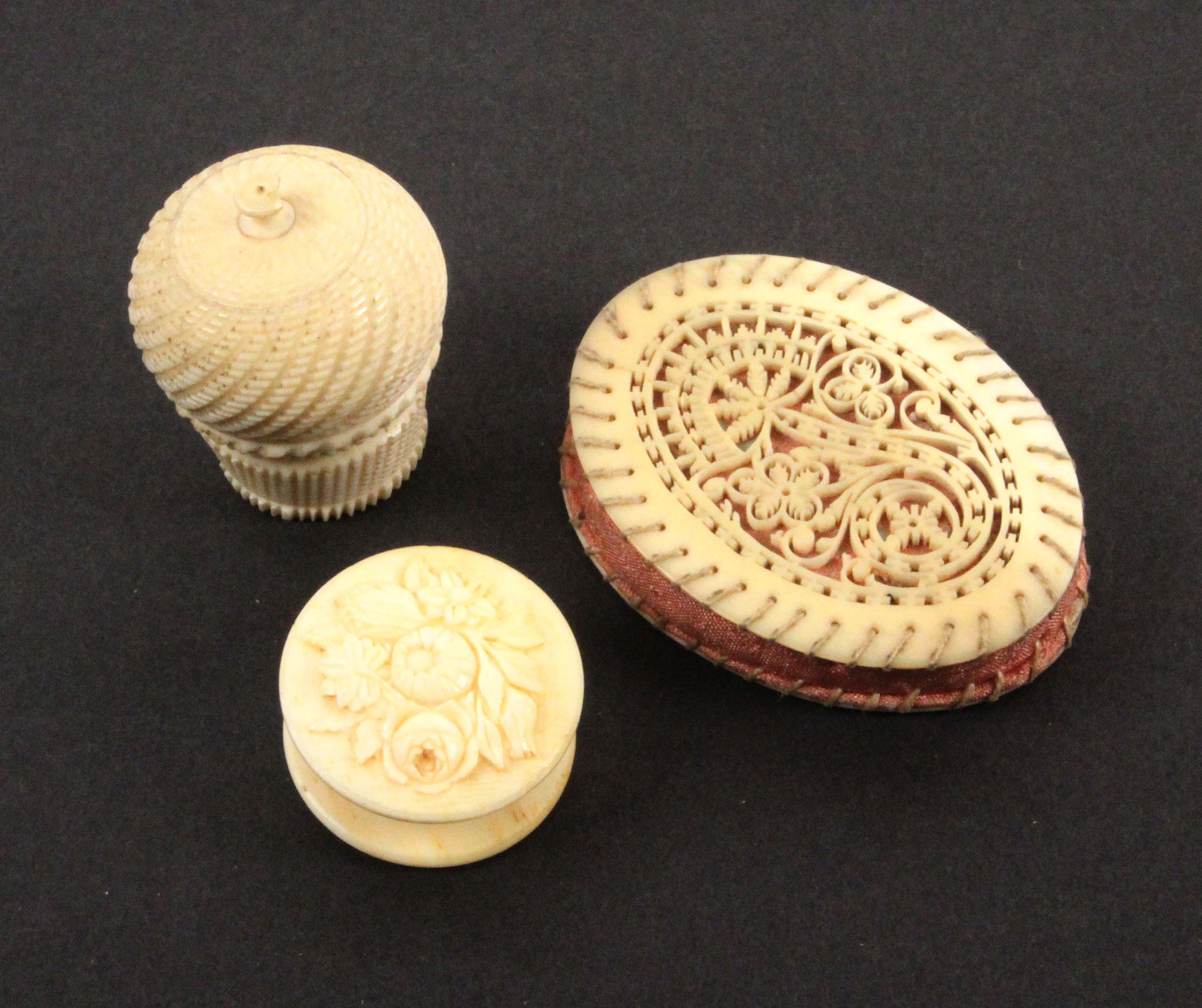 Two 19th Century ivory pin cushions and a waxer, comprising an oval pin cushion with finely - Image 2 of 2