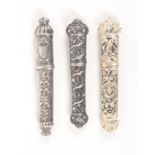 Three 19th Century continental silver needle cases, all of quiver form and variously decorated,