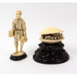 Two late 19th Century Japanese carved ivory pieces, comprising an open pearl shell revealing figures