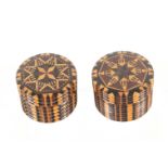 A near pair of rib turned rosewood stick ware cylinder boxes, each with screw-off stick ware lid,