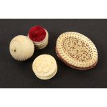 Two 19th Century ivory pin cushions and a waxer, comprising an oval pin cushion with finely