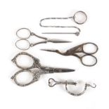 A mixed lot, sewing, comprising a pair of steel bladed scissors with engraved silver arms and loops,