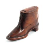 An unusual Boer War P.O.W. shoe form snuff box, in cedar wood with carved details, rounded toe,